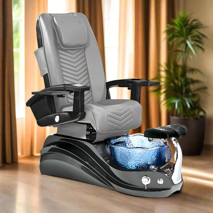 A glossy black pedicure spa chair with a unique floral-shaped basin adorned with iridescent crystals, featuring leather seats and a metal structure. A 'Limited 2-Year Warranty' badge is displayed on the chair.