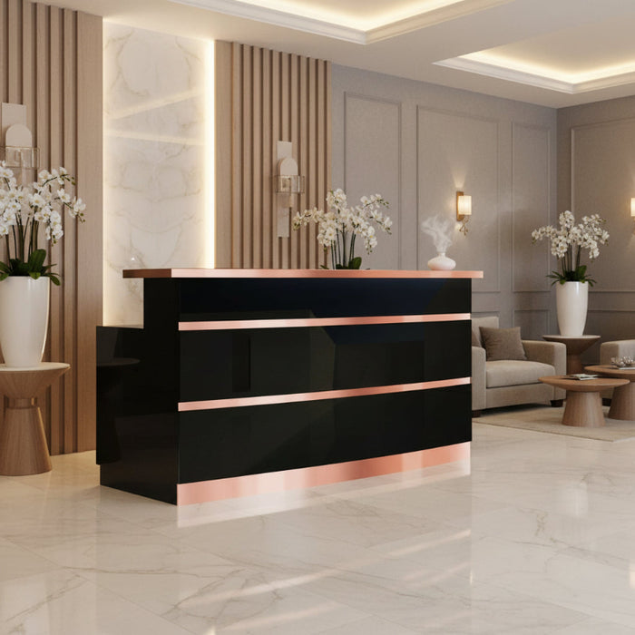 Modern black reception desk with rose gold accents in a stylish interior setting.