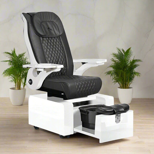Black and white pedicure chair with a limited two-year warranty badge on a white background