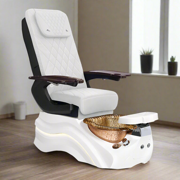 A modern white pedicure spa chair with black and brown accents, featuring a diamond-quilted design, massage controls, and a glass basin.