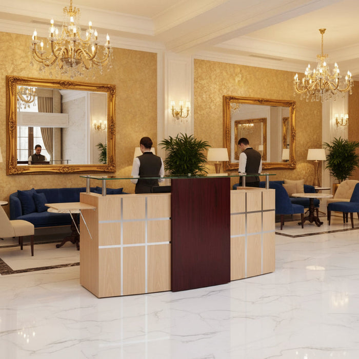 A modern receptionist counter with a glass panel and wooden accents, featuring a pull-out tray and chrome trim.