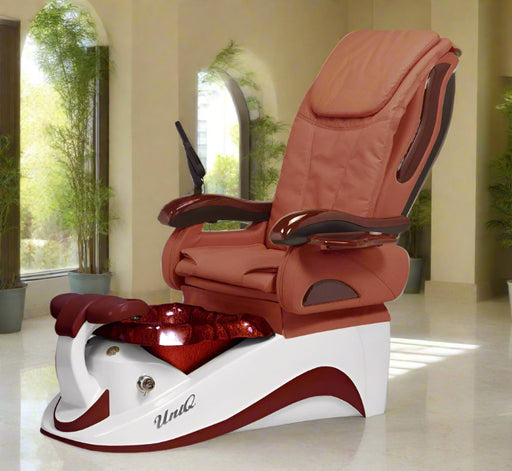 A Uniq Pedicure Chair with a mission tile and burgundy with white color scheme, featuring a comfortable seat, armrests, and a footrest.