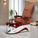 A Uniq Pedicure Chair with a mission tile and burgundy with white color scheme, featuring a comfortable seat, armrests, and a footrest.