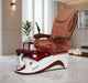 A Uniq Pedicure Chair with a mission tile and burgundy with white color scheme, featuring a comfortable seat, armrests, and a footrest.